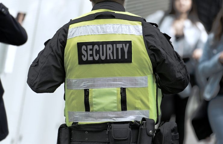 Security officer on foot patrol in a public area